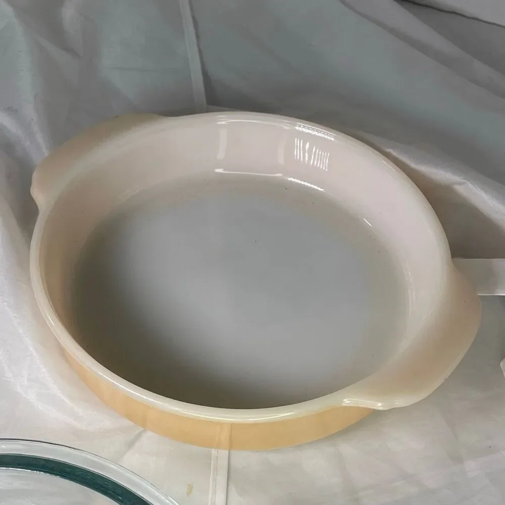 Vintage Fire King Peach Luster Casserole dish with glass lid.